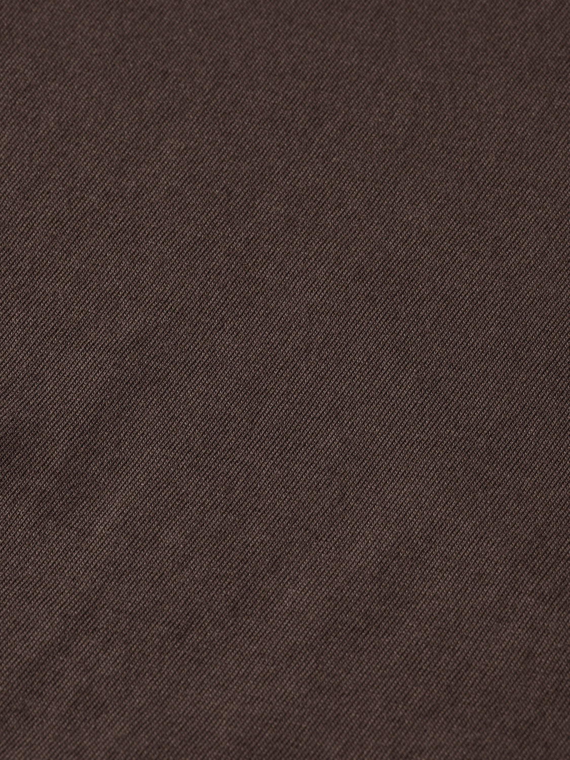 Long-sleeved Scotch & Soda T-shirt with a relaxed fit, featuring a soft fabric in a solid color, displayed on a hanger.
