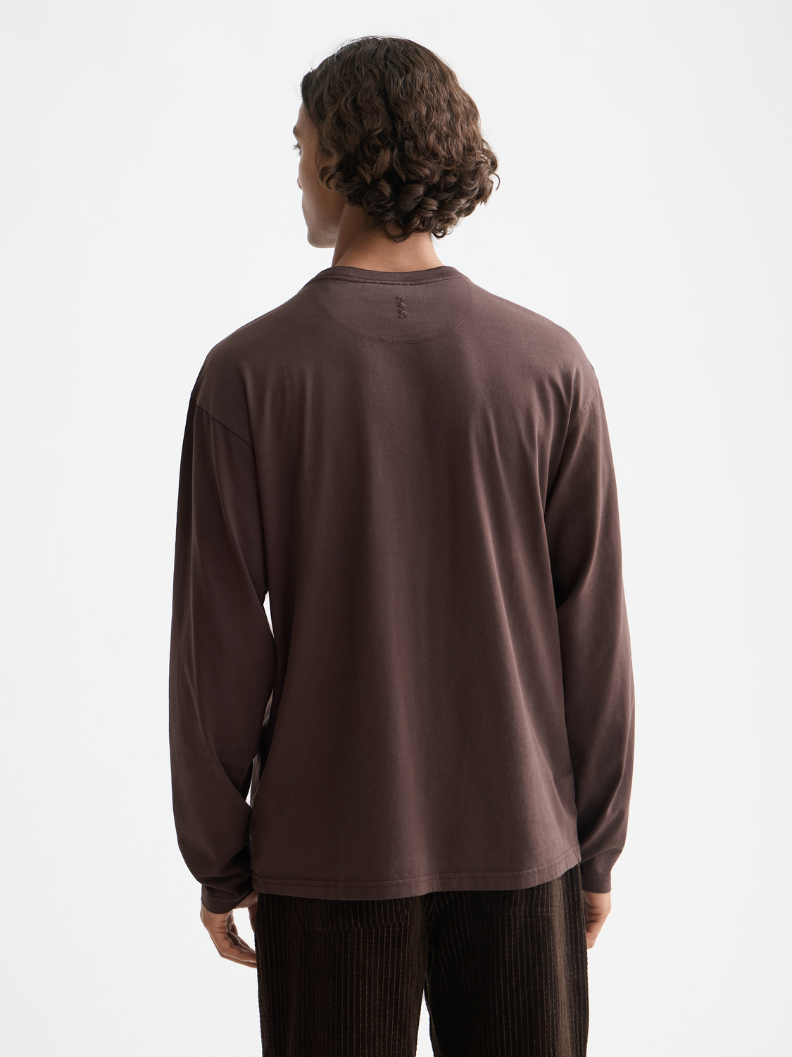 Long-sleeved Scotch & Soda T-shirt with a relaxed fit and crew neckline, shown from the back in a casual style.