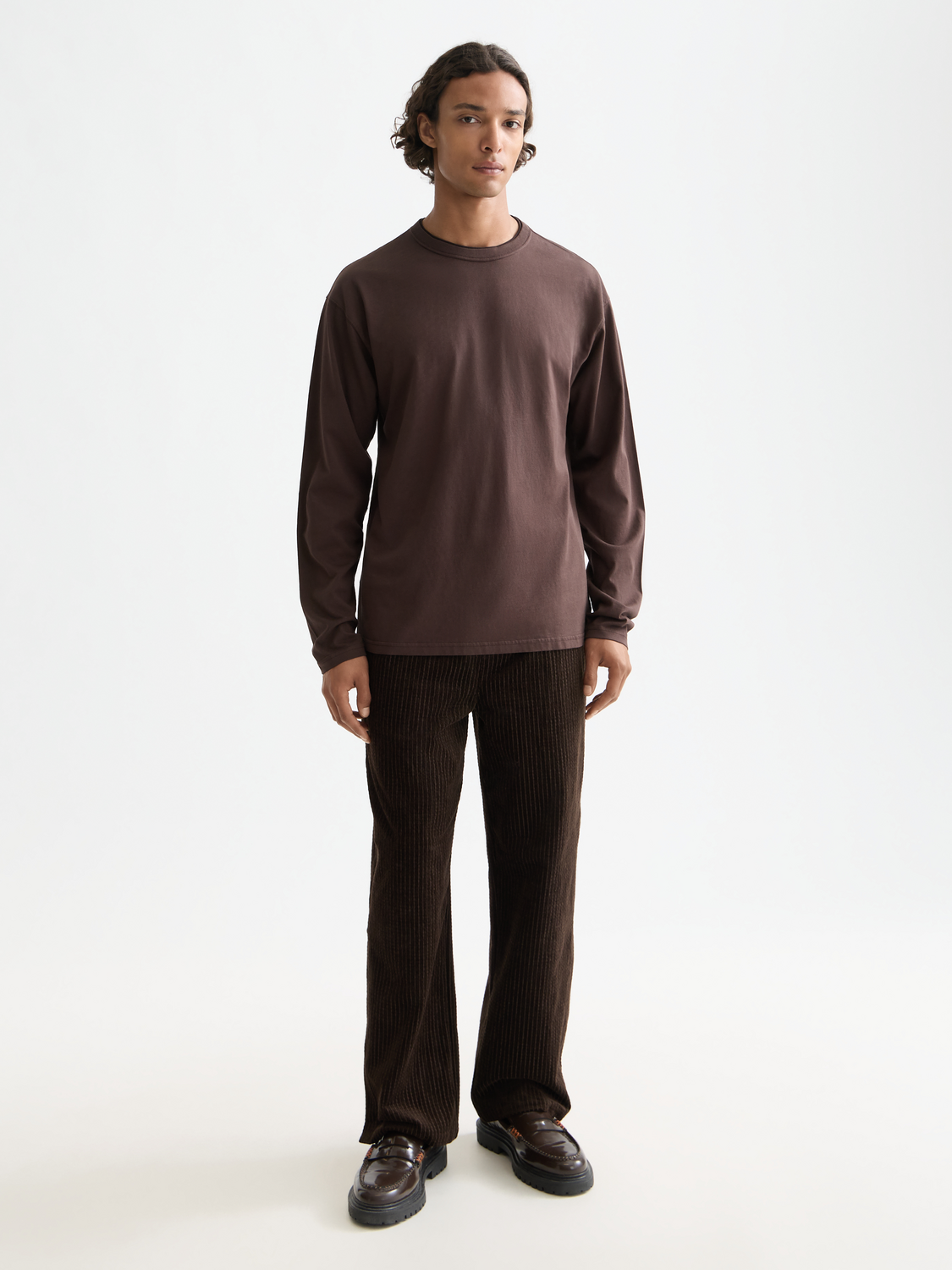 Long-sleeved Scotch & Soda T-shirt with a round neckline, featuring a casual fit and soft fabric in a neutral color.