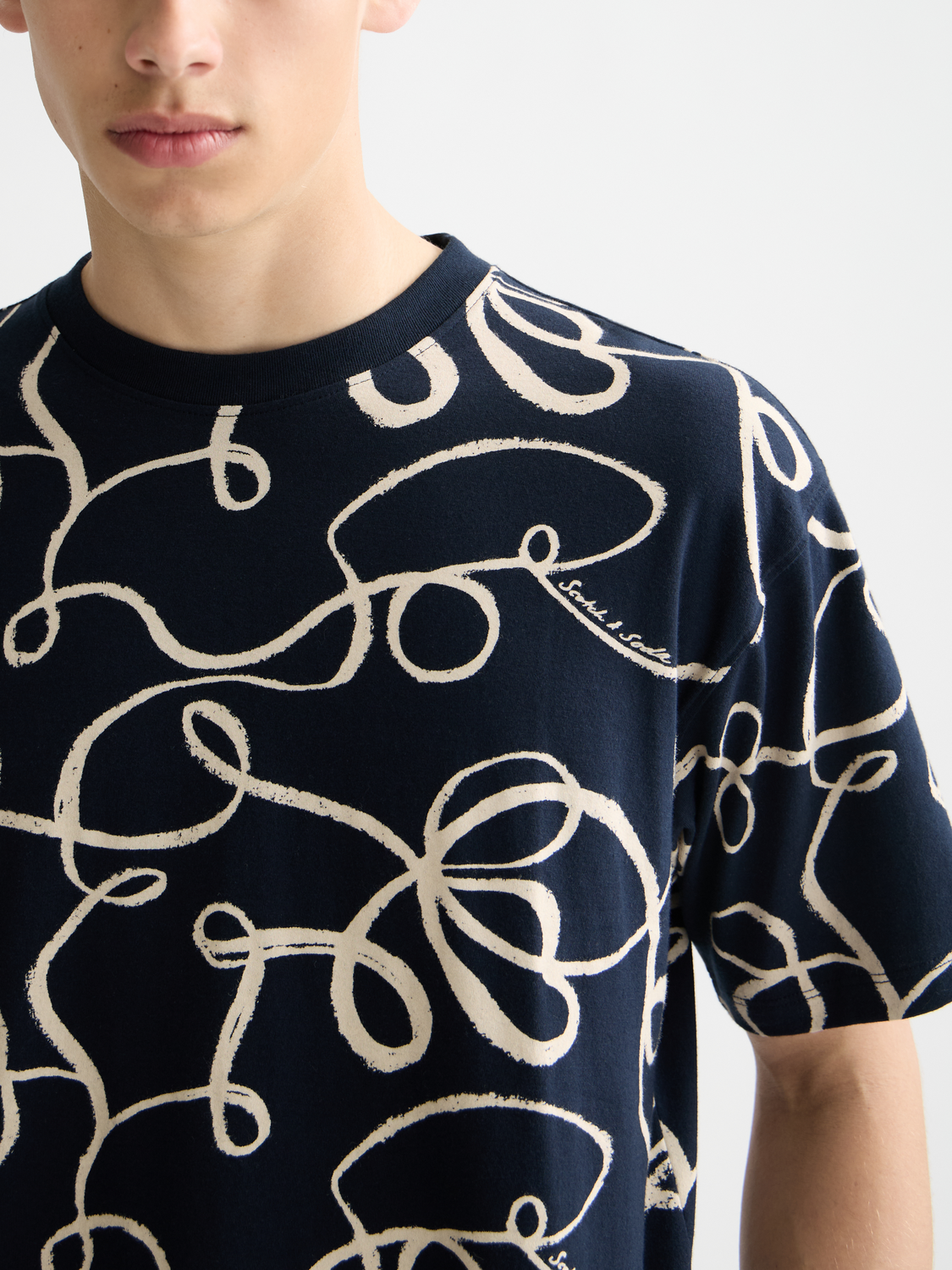 Printed Scotch & Soda short sleeve T-shirt with colorful graphic design, casual fit, and soft fabric.