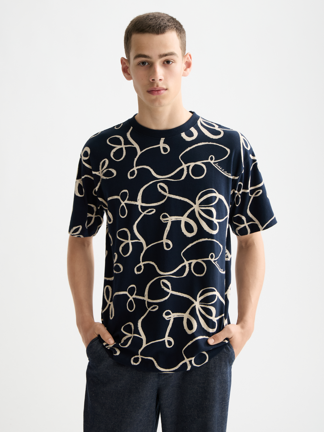 Printed SCOTCH & SODA short-sleeve T-shirt with a graphic design on the front, displayed flat.