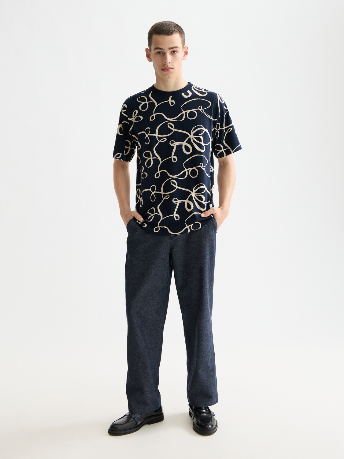 Printed Scotch & Soda short sleeve T-shirt featuring a colorful graphic design on the front.