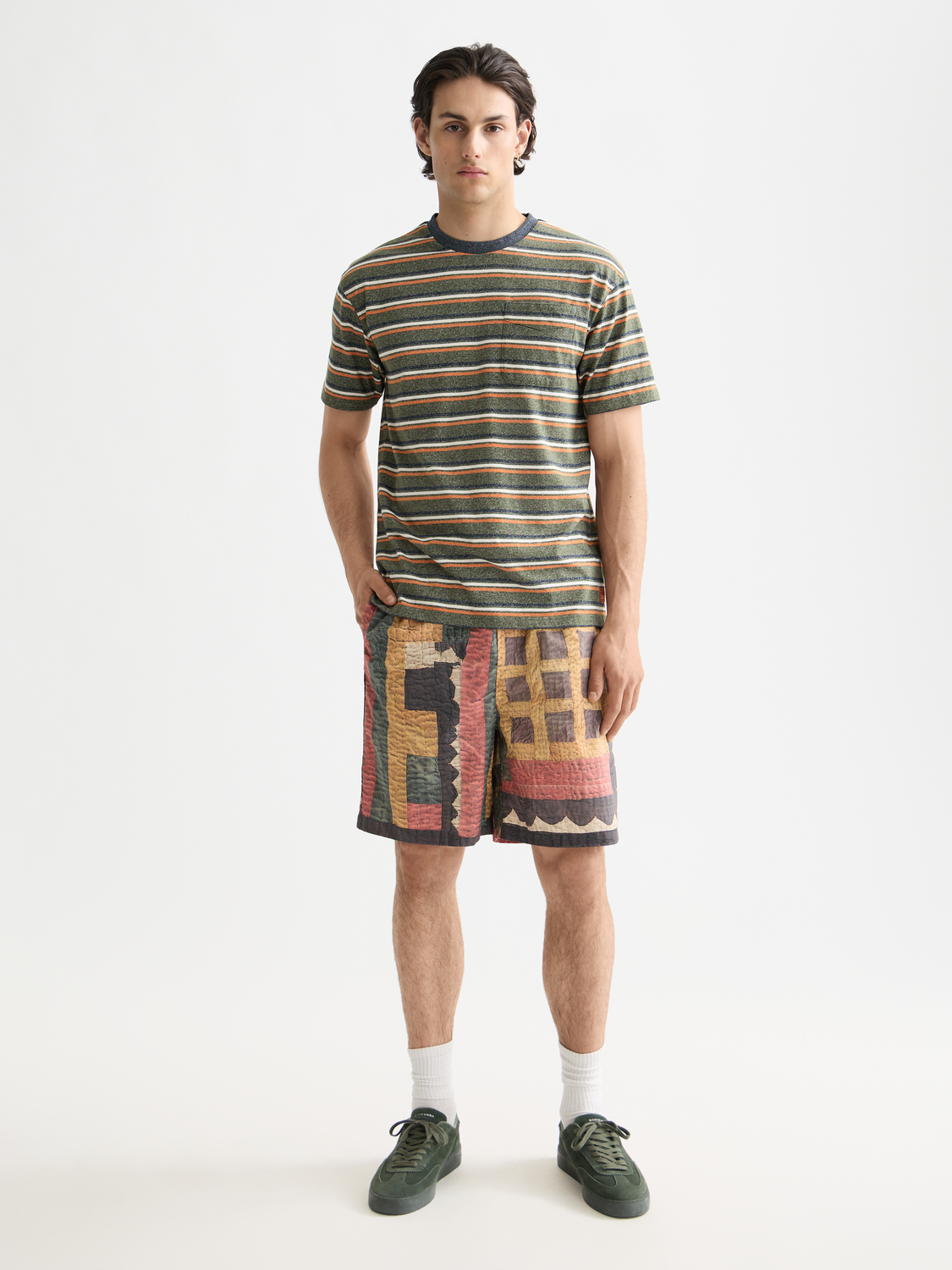 Yarn-dyed striped Scotch & Soda short-sleeve t-shirt with a crew neckline, featuring colorful vertical stripes and a casual fit.