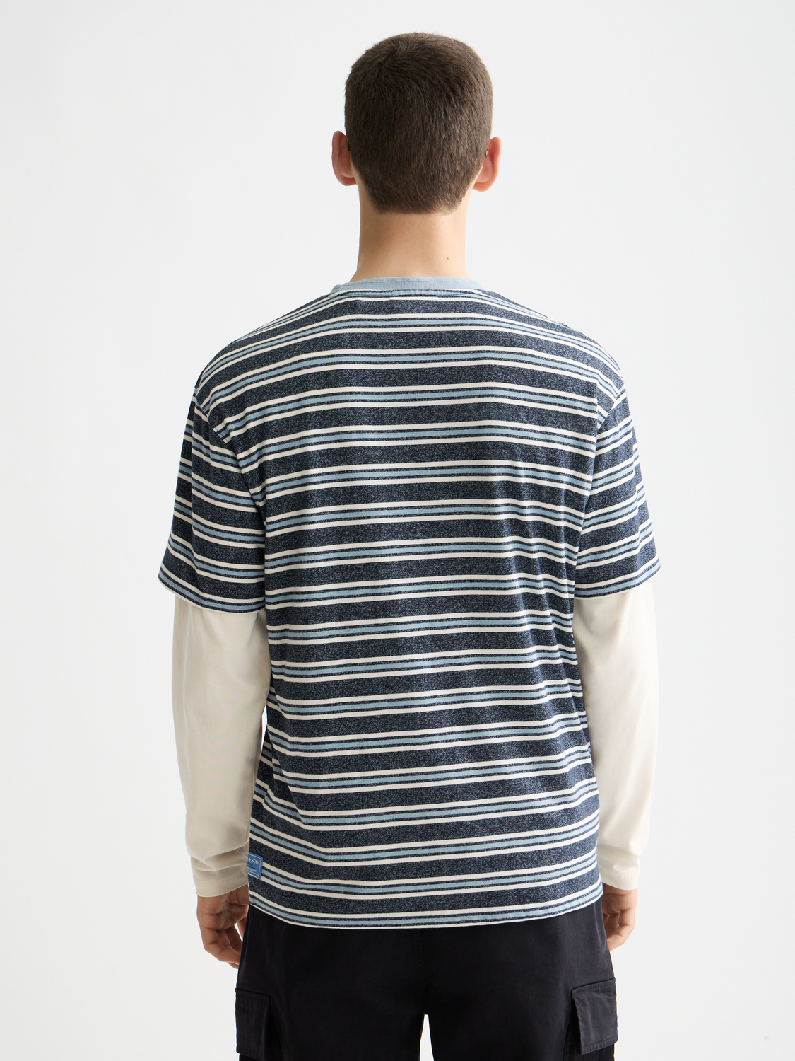 Yarn-dyed striped Scotch & Soda short-sleeve t-shirt with blue and white horizontal stripes, back view.