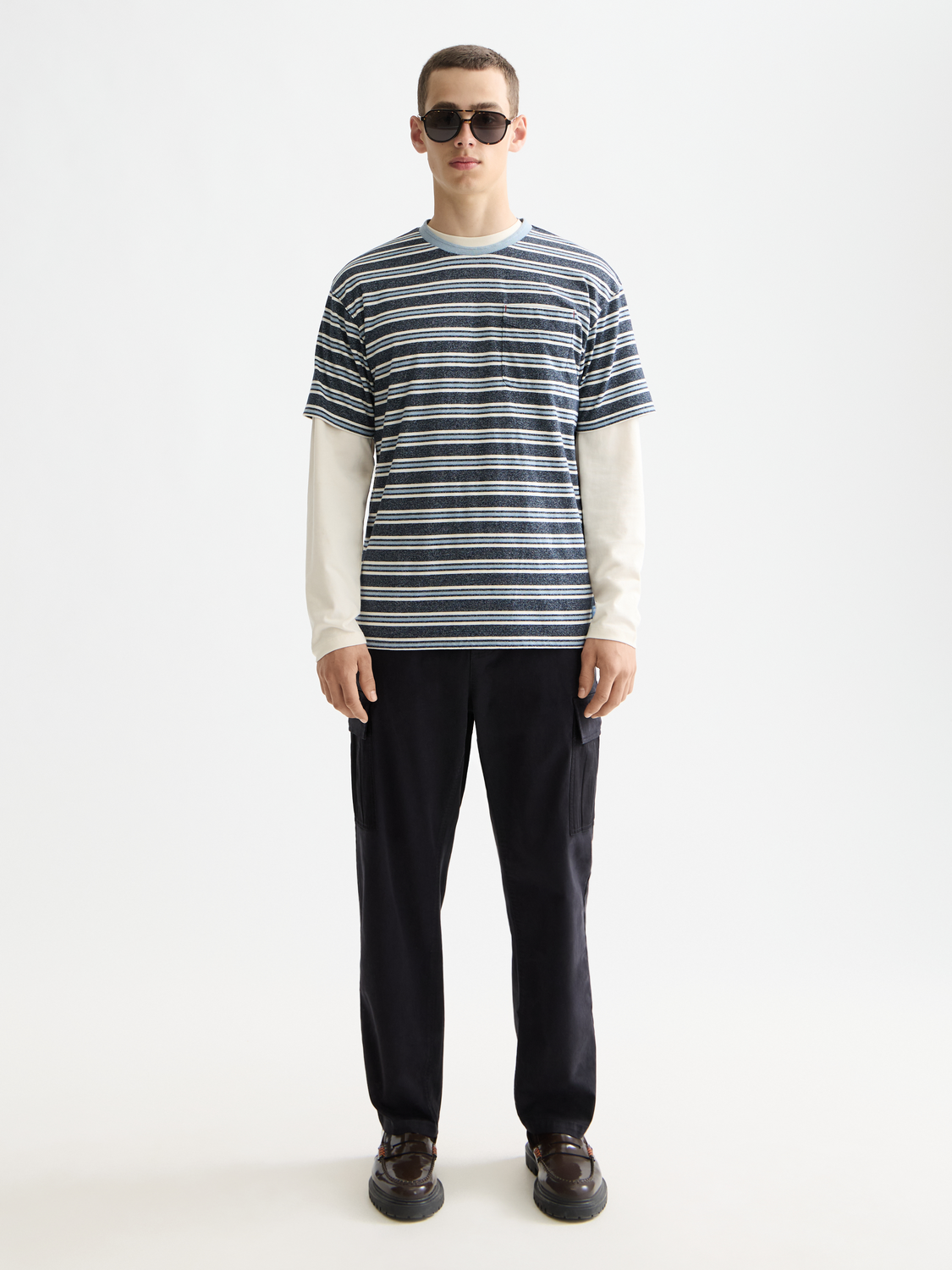 Striped yarn-dyed Scotch & Soda short-sleeve t-shirt with classic crew neck and vibrant color pattern.