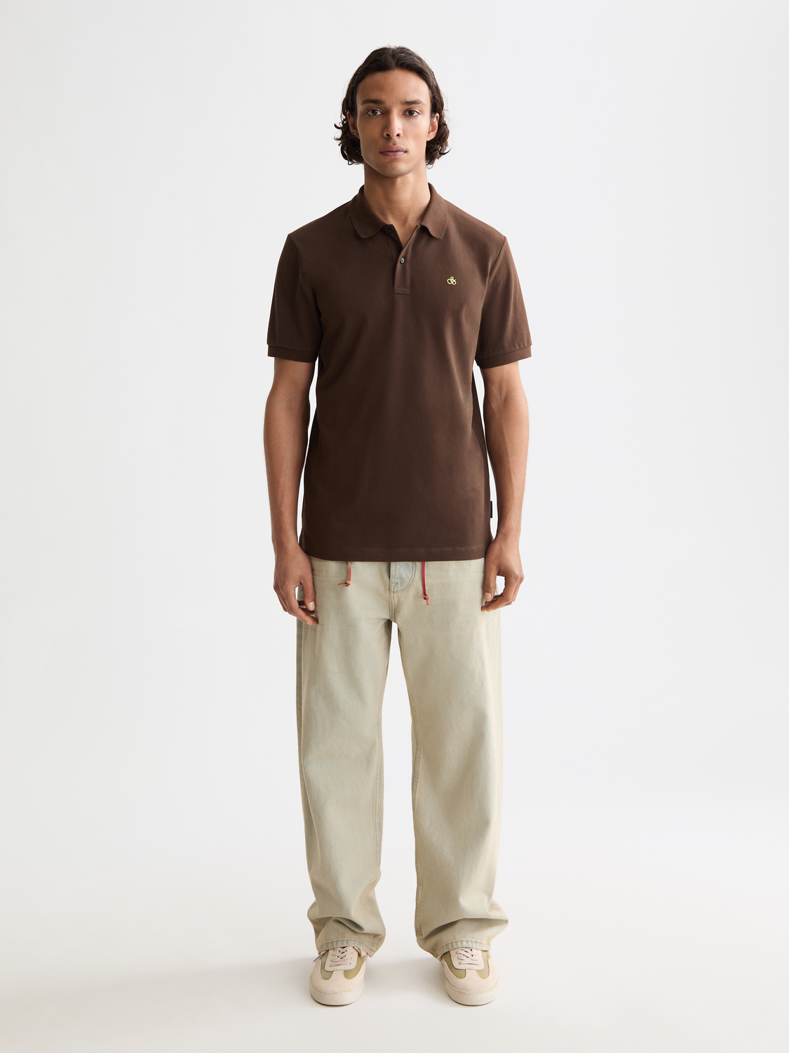 Regular-fit Scotch & Soda polo shirt in navy, featuring a classic collar and short sleeves, displayed on a neutral background.