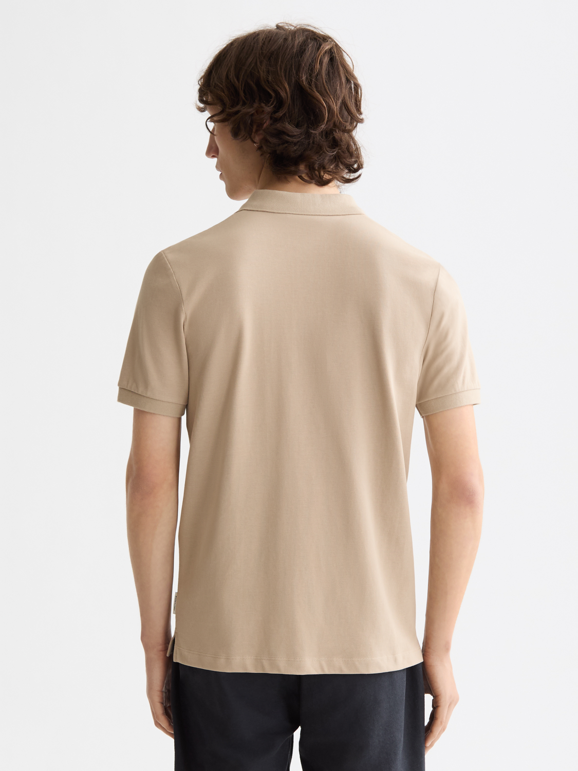 Regular-fit Scotch & Soda polo shirt in a solid color, shown from the back with a classic collar and short sleeves.