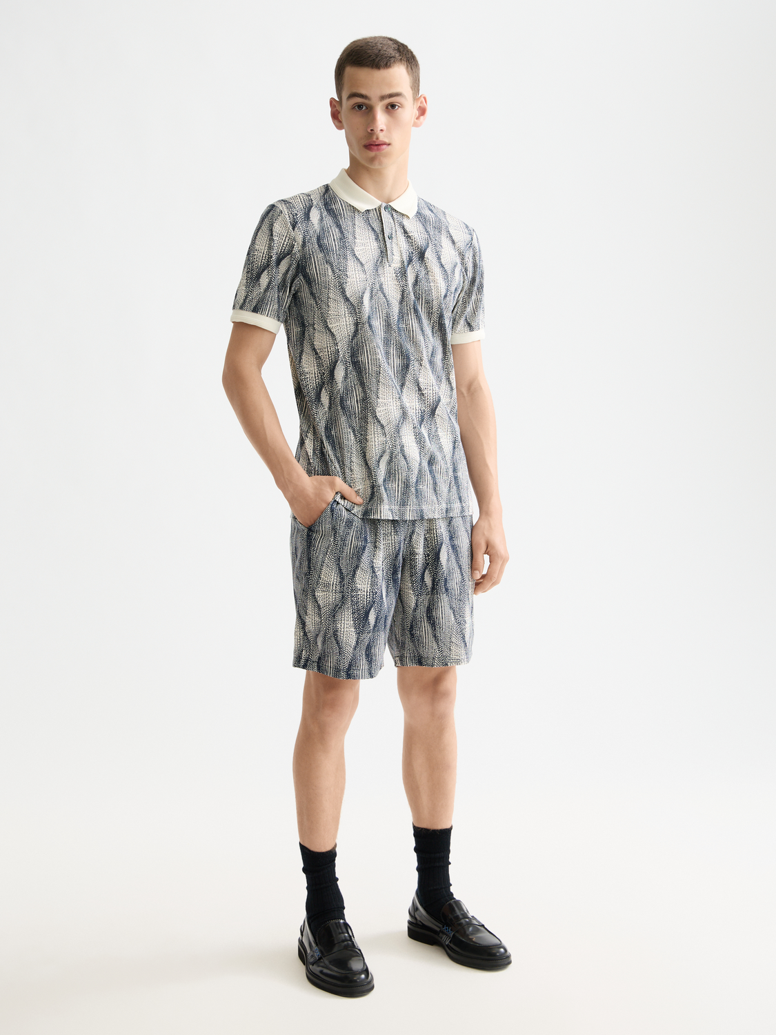 Printed polo shirt by Scotch & Soda, featuring a stylish design, short sleeves, and a classic collar.