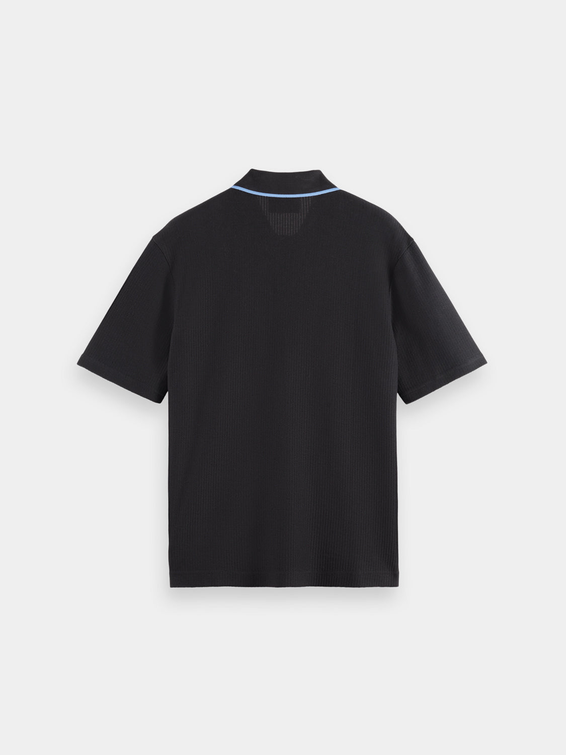 Black structured polo shirt by Scotch & Soda, featuring a fitted design and classic collar, displayed on a hanger.