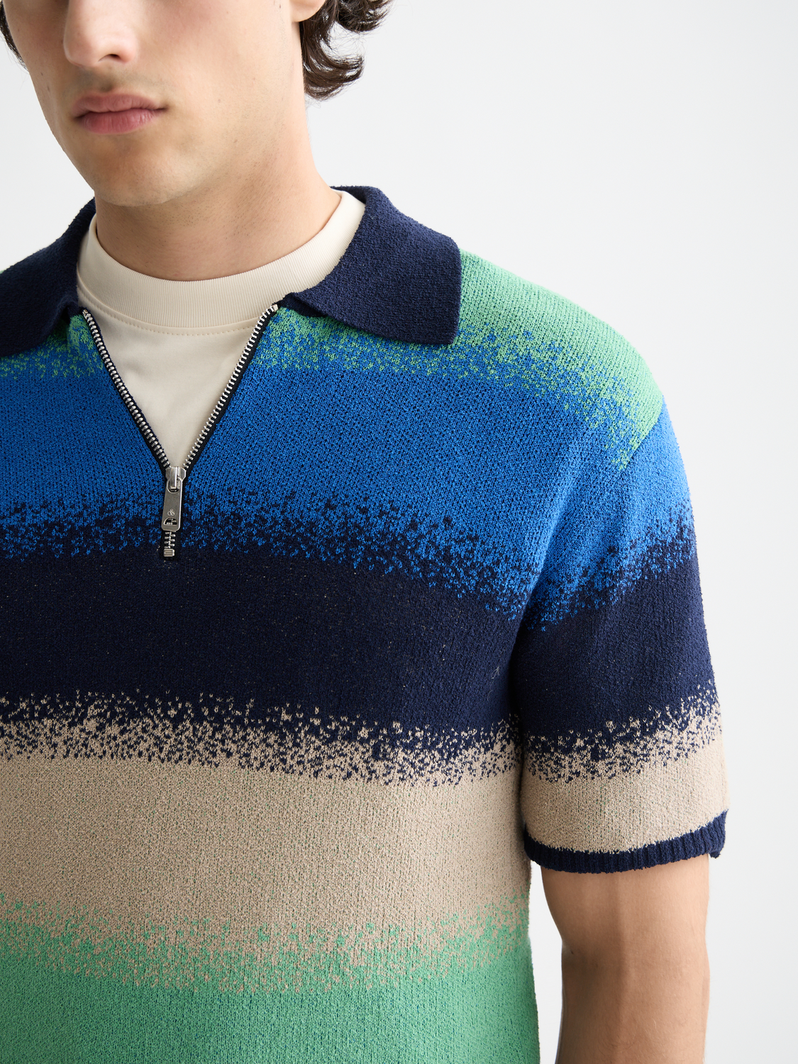 Scotch & Soda knitted gradient polo shirt with a classic collar and short sleeves, featuring a stylish multicolor gradient design.
