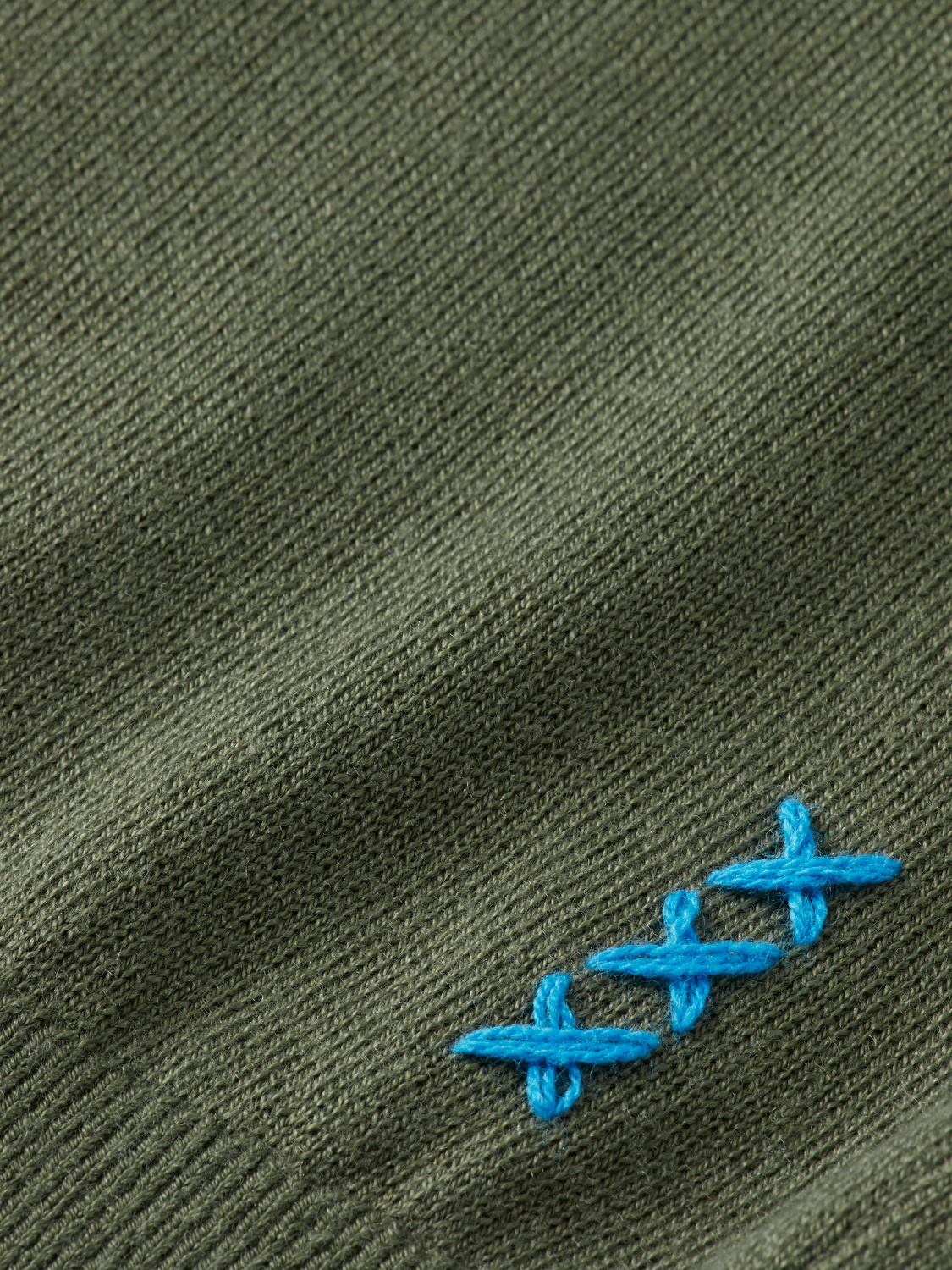 Scotch & Soda mock neck knit pullover in a cozy, textured design, displayed on a neutral background.