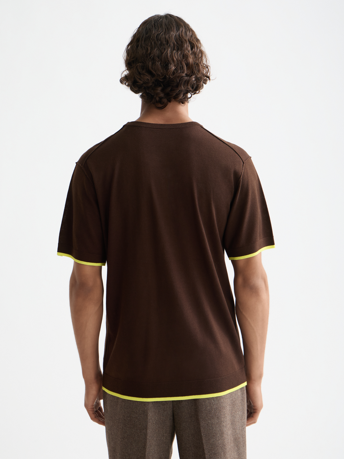 Knitted T-shirt by Scotch & Soda, soft knitwear with a relaxed fit, shown from the back in the product image.