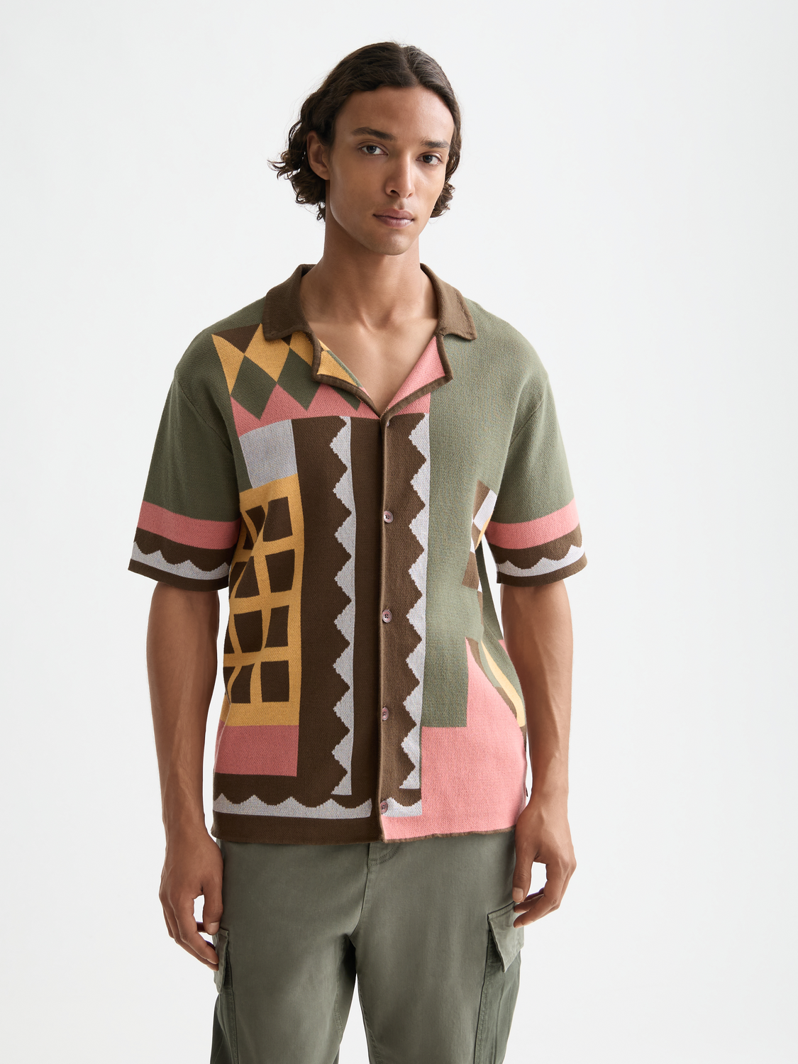 Knitted short-sleeved shirt from SCOTCH & SODA, showcasing a textured knit fabric and classic fit in a neutral color