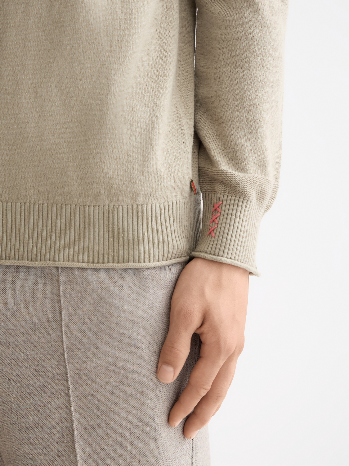 Wool-blend knitwear pullover by Scotch & Soda featuring a classic crew neck and textured pattern in neutral tones.