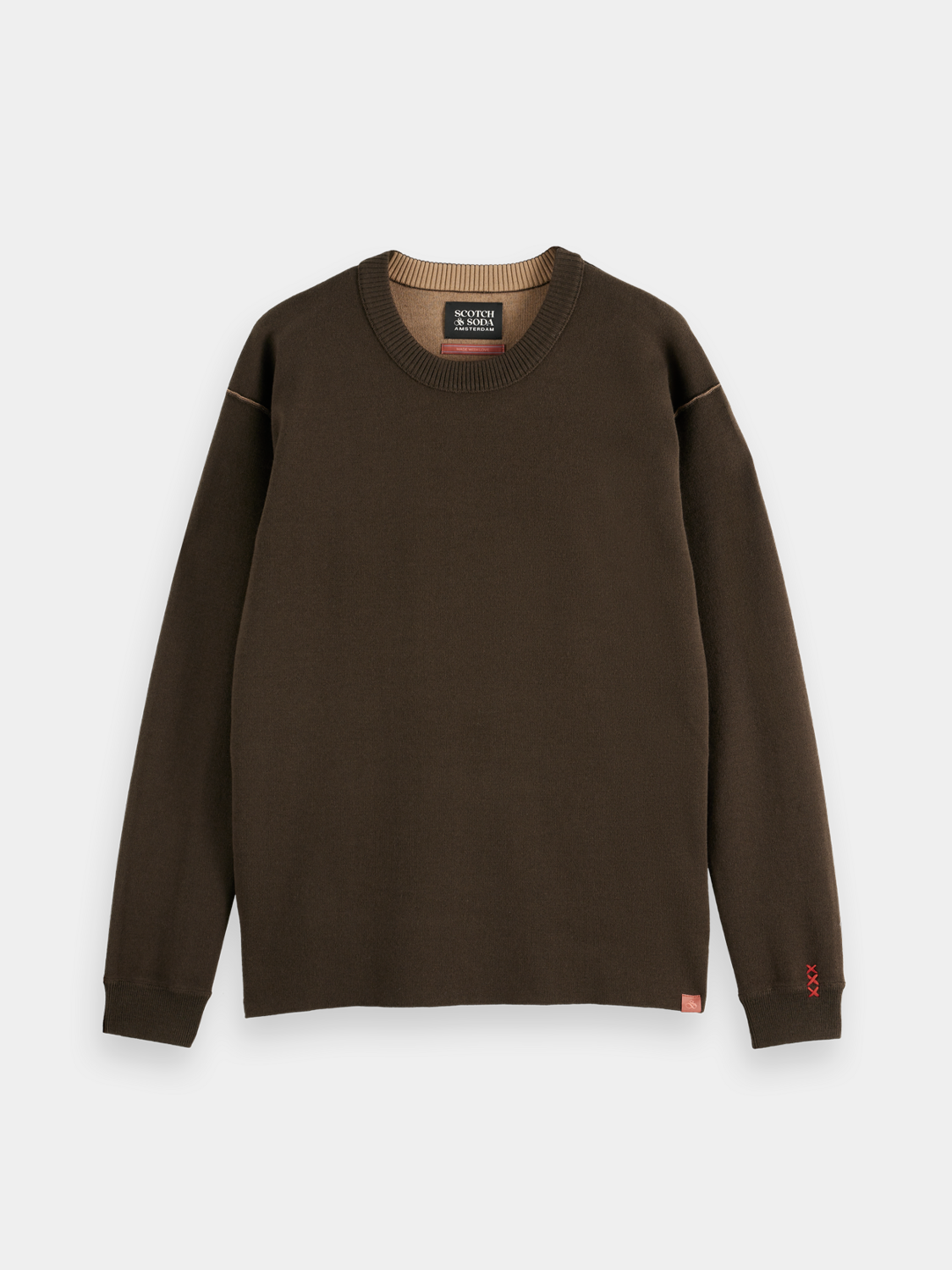 Close-up of SCOTCH & SODA crewneck pullover knitwear, showing the textured fabric and classic crewneck design.