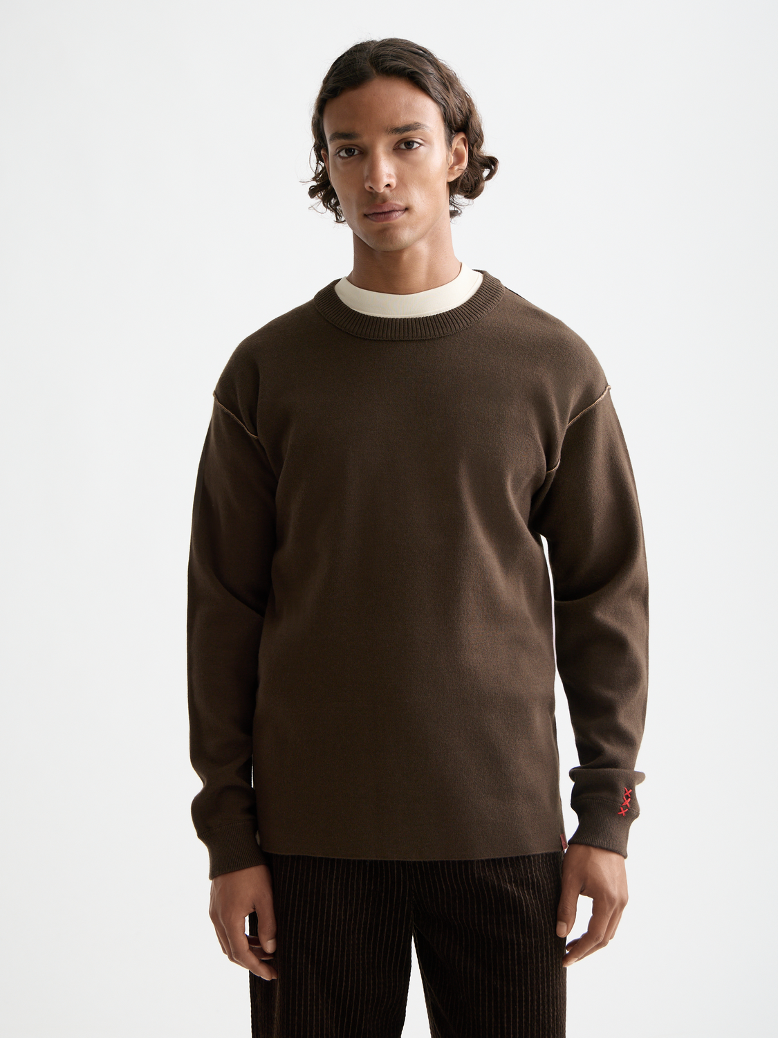 SCOTCH & SODA crewneck pullover in knitwear with a classic fit, shown in a front view with detailed stitching and soft fabric texture.