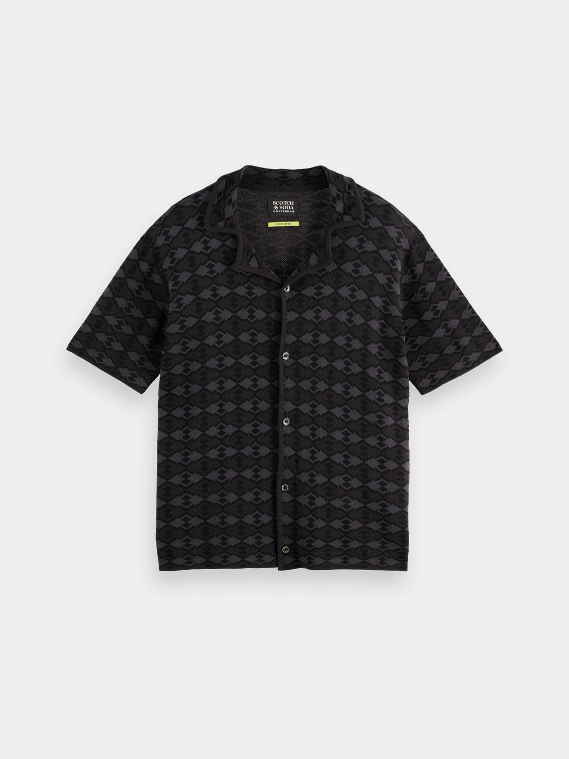 Knitted short-sleeved shirt from SCOTCH & SODA in soft knit fabric, displayed on a hanger with a neutral background.