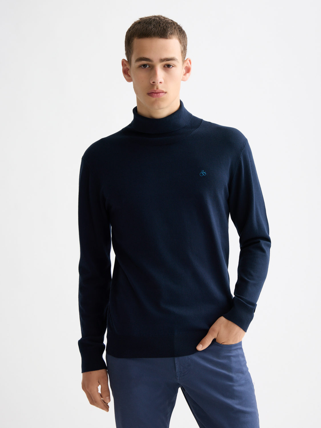 SCOTCH & SODA knitwear turtleneck sweater in a vibrant color, featuring a close-up of the fabric and stylish design details.