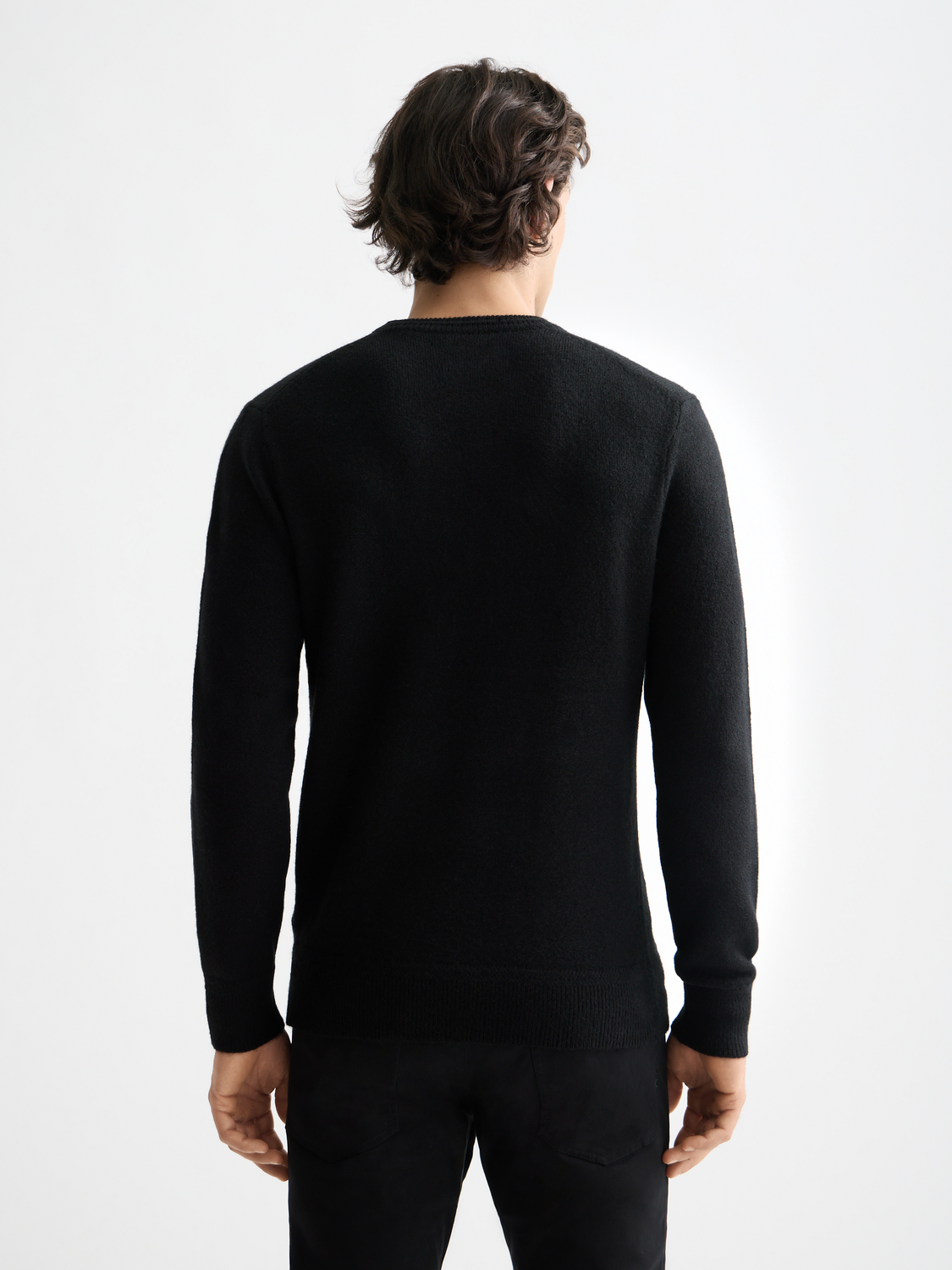 Soft knit pullover from Scotch & Soda featuring a cozy knitwear design, shown from the back in the image.