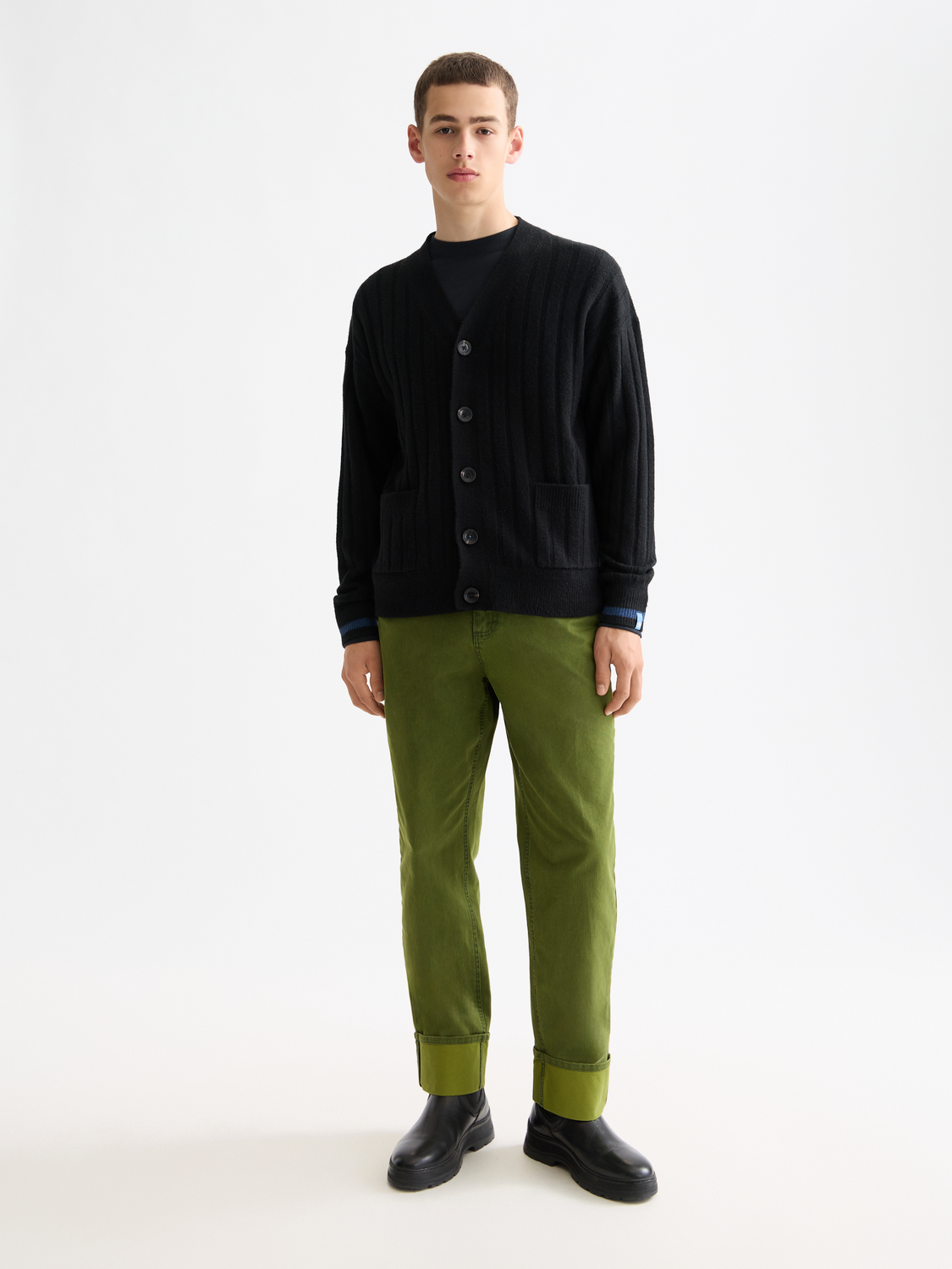 Scotch & Soda knitted cardigan in soft knitwear with a button-up front and ribbed cuffs, displayed on a neutral background.