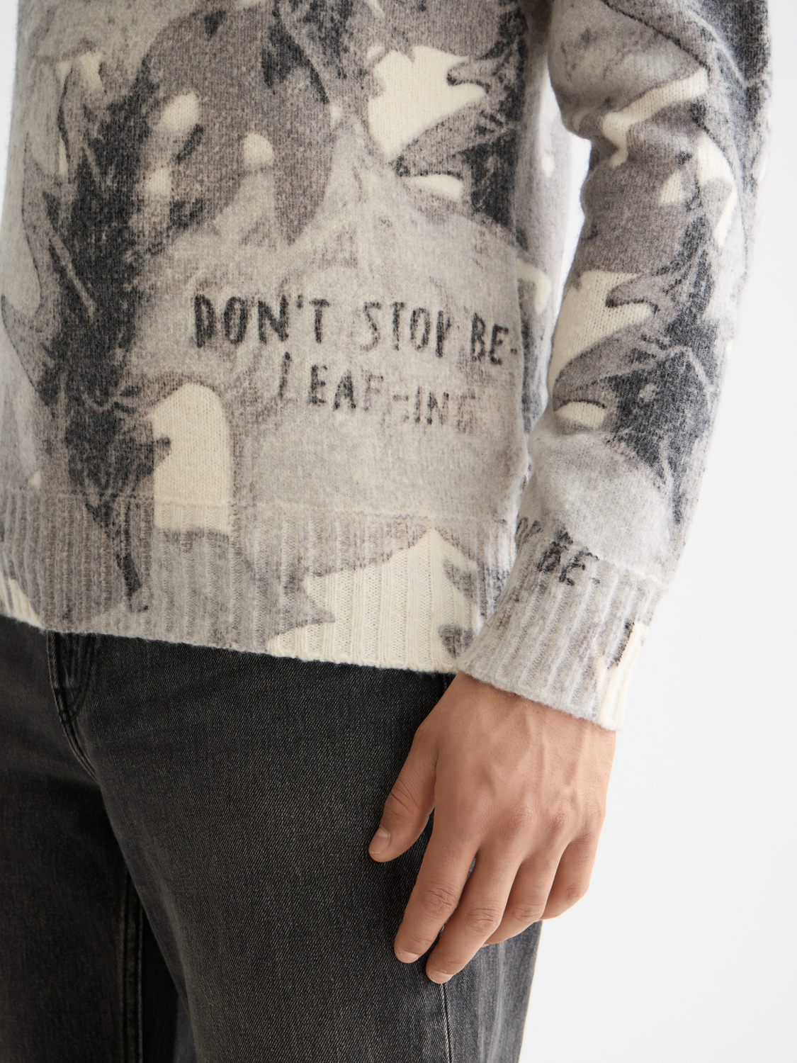 Printed SCOTCH & SODA knitwear pullover with bold patterns, showcasing a cozy, stylish design perfect for casual wear.