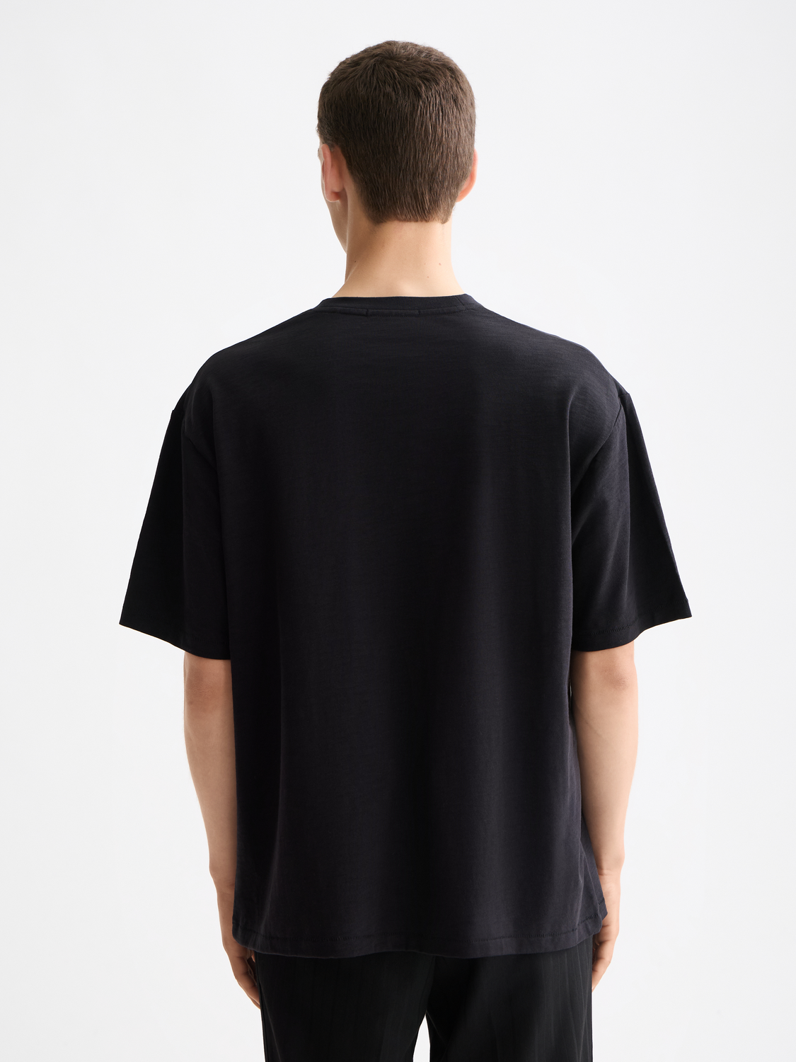 Short sleeve Scotch & Soda artwork t-shirt with colorful graphic print on front, casual fit, and crew neckline.