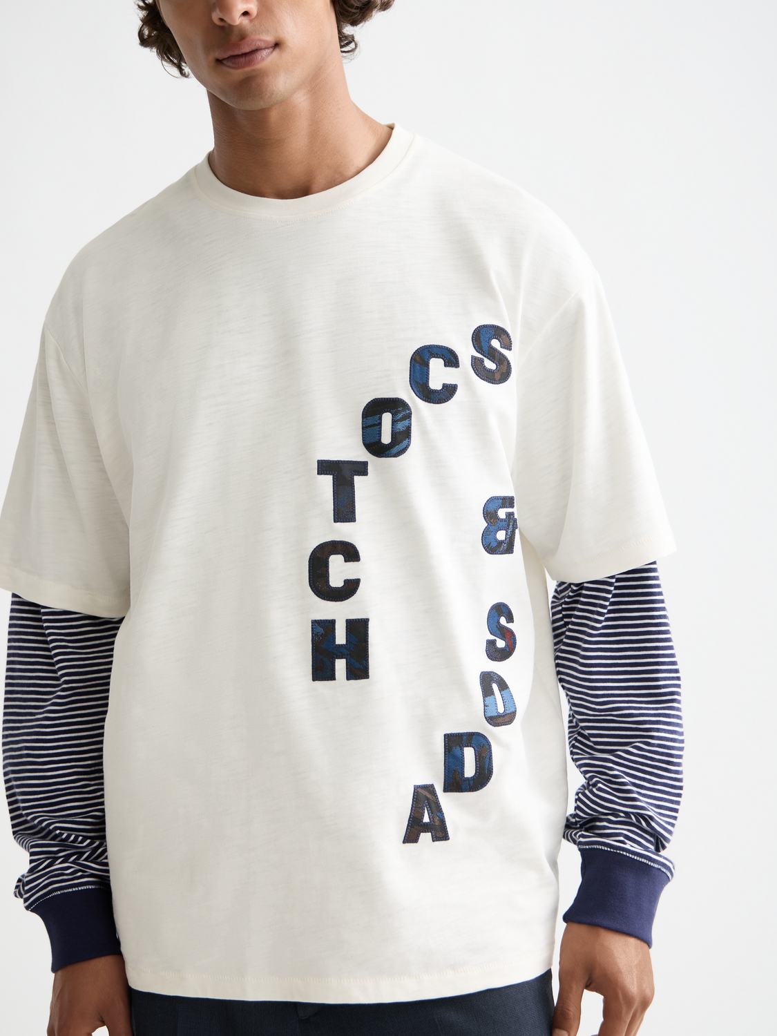 Scott & Soda artwork t-shirt featuring a colorful design on a short sleeve tee, casual fashion for men.
