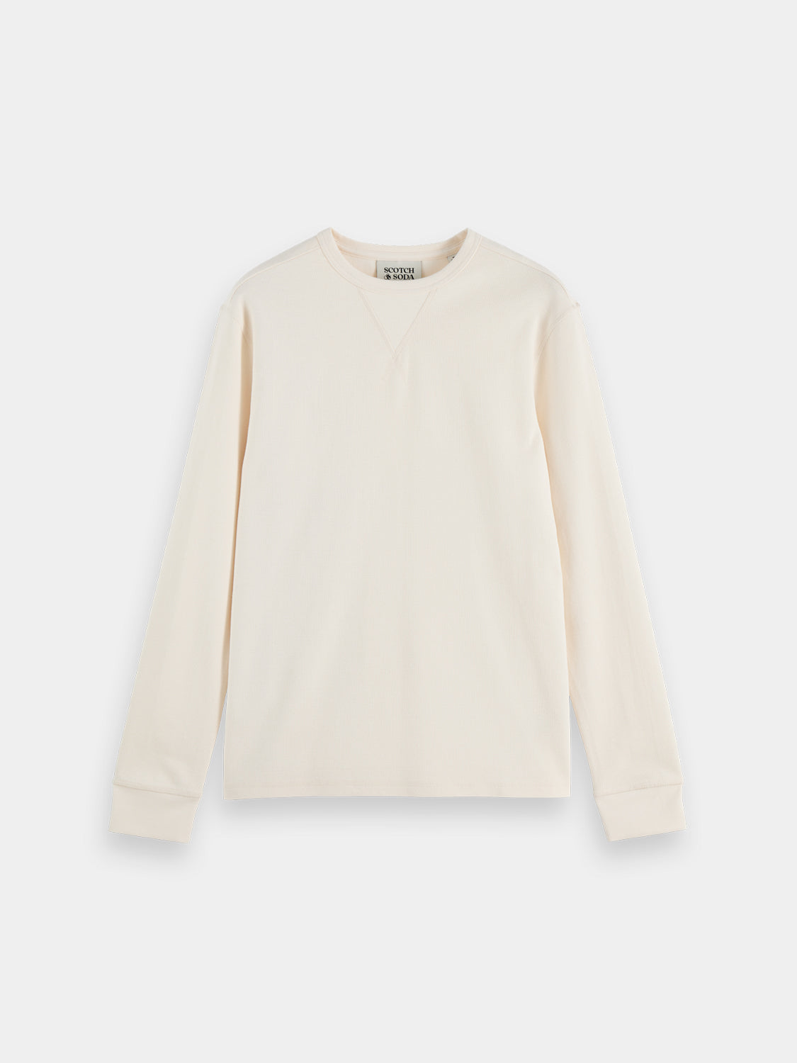 Scotch & Soda waffle long-sleeved T-shirt with textured fabric and fitted style, shown in beige on a model.