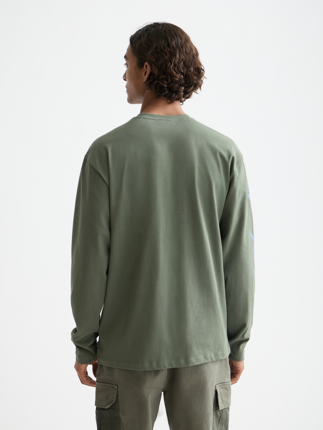 Long-sleeved Scotch & Soda artwork T-shirt with colorful graphic design on front and back, casual streetwear style.