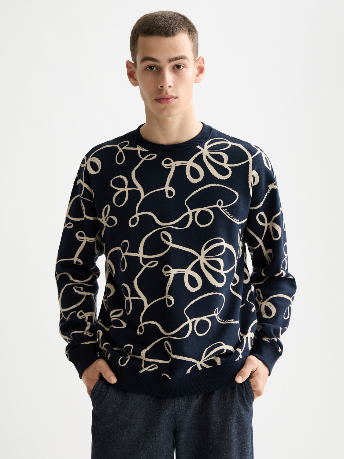 Printed Scotch & Soda sweatshirt featuring a stylish graphic design, made from comfortable sweats fabric, front view.