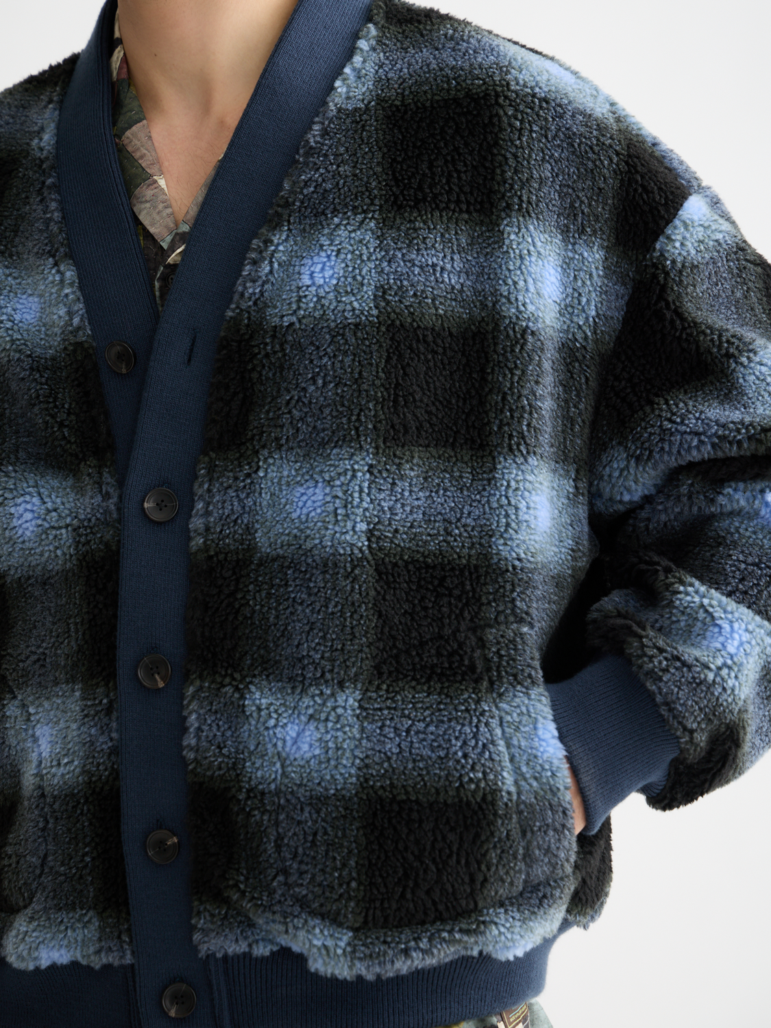 Soft navy fleece cardigan from Scotch & Soda with a relaxed fit and cozy texture, ideal for casual wear.