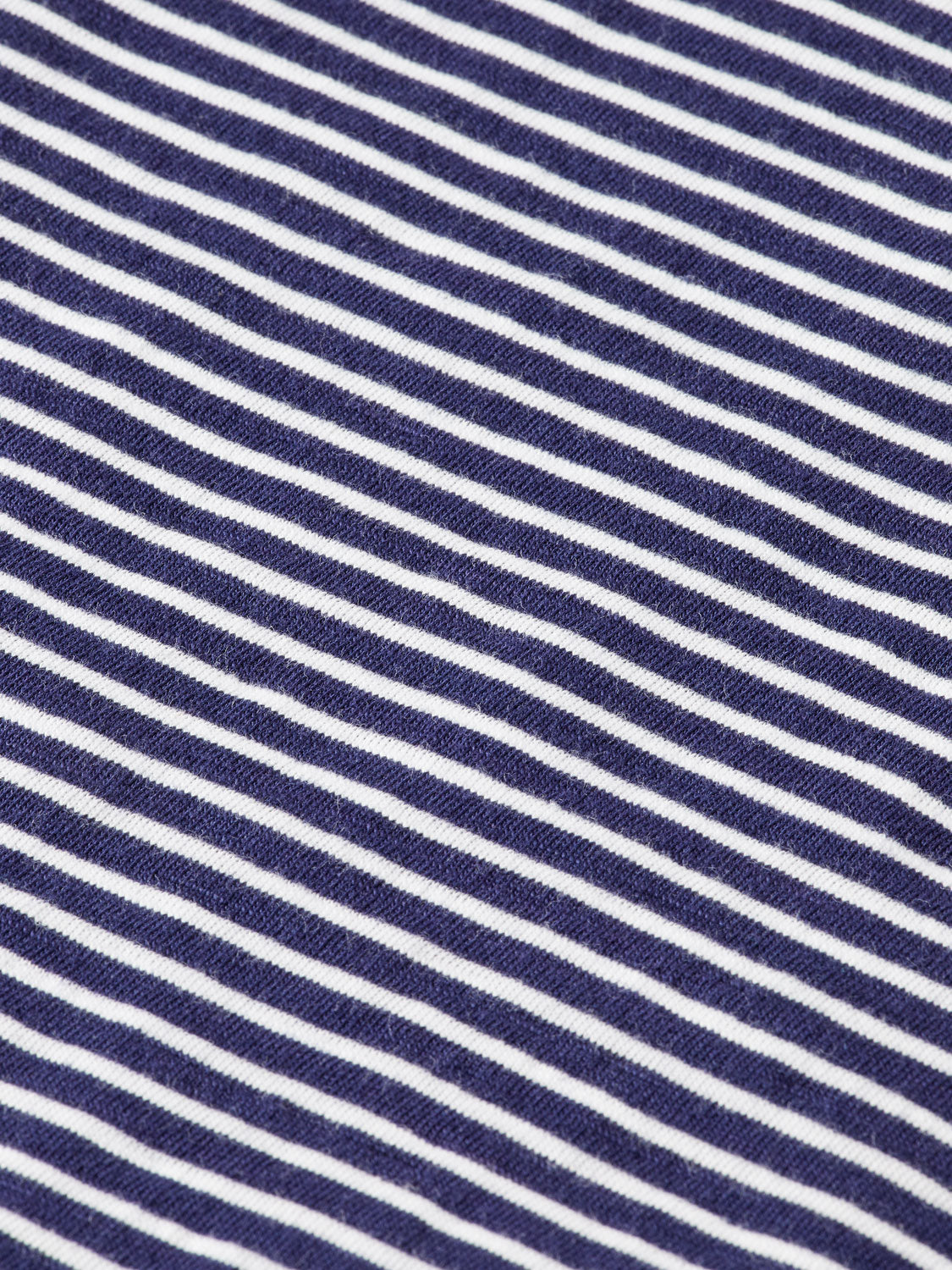 Long-sleeve striped Henley t-shirt by Scotch & Soda with buttoned neckline and casual fit, shown on a plain background.