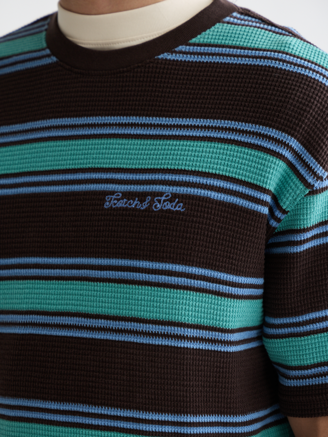 Light blue Scotch & Soda waffle T-shirt with short sleeves, casual fit, and textured fabric for a comfortable, stylish look.