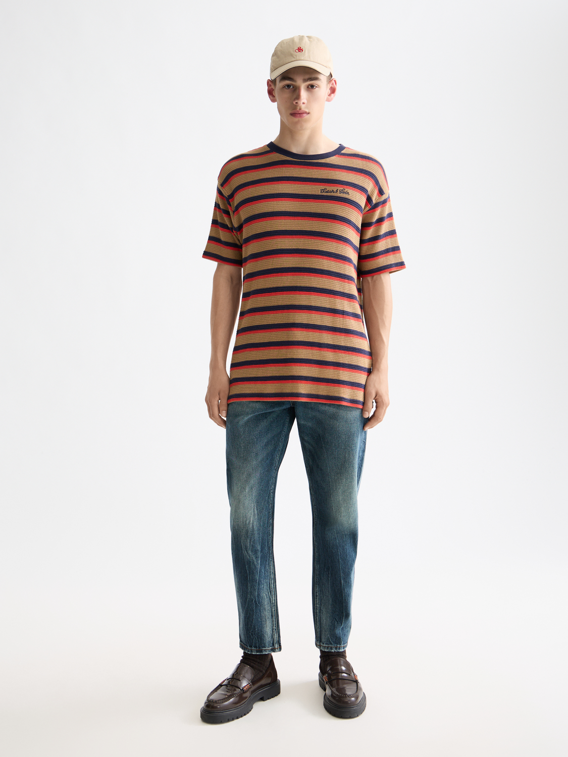 Short-sleeve waffle T-shirt by Scotch & Soda featuring a textured fabric and classic fit, shown in a front view.