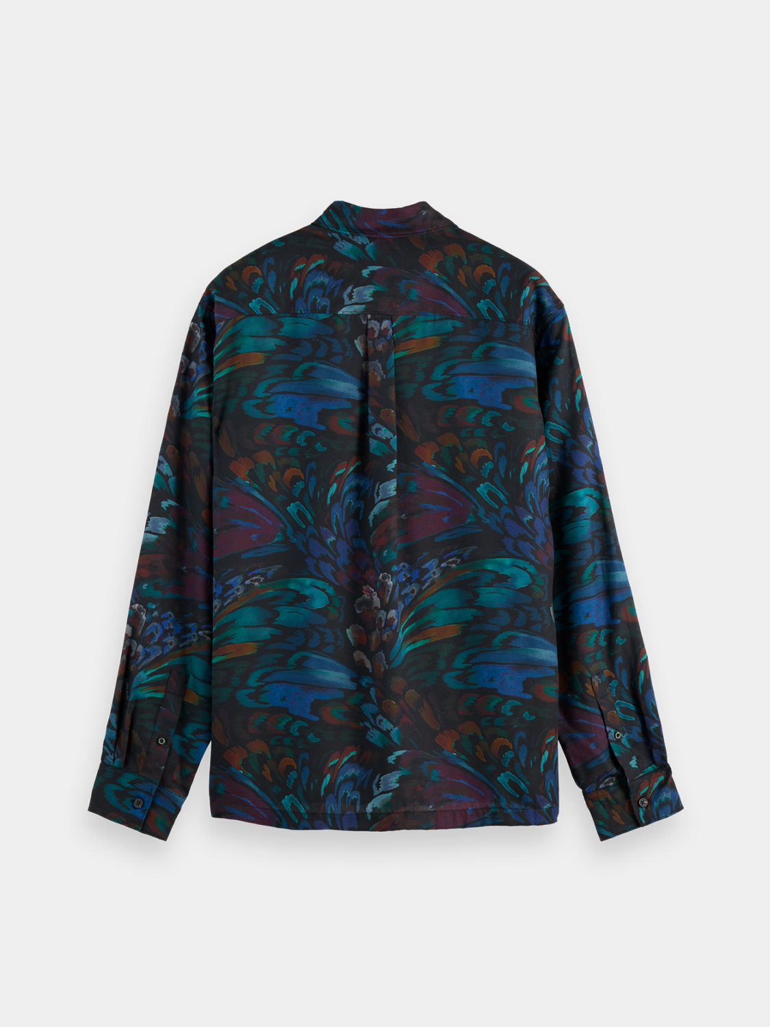 Long-sleeve printed shirt by Scotch & Soda, featuring vibrant patterns and casual fit, shown hanging on a wooden hanger.