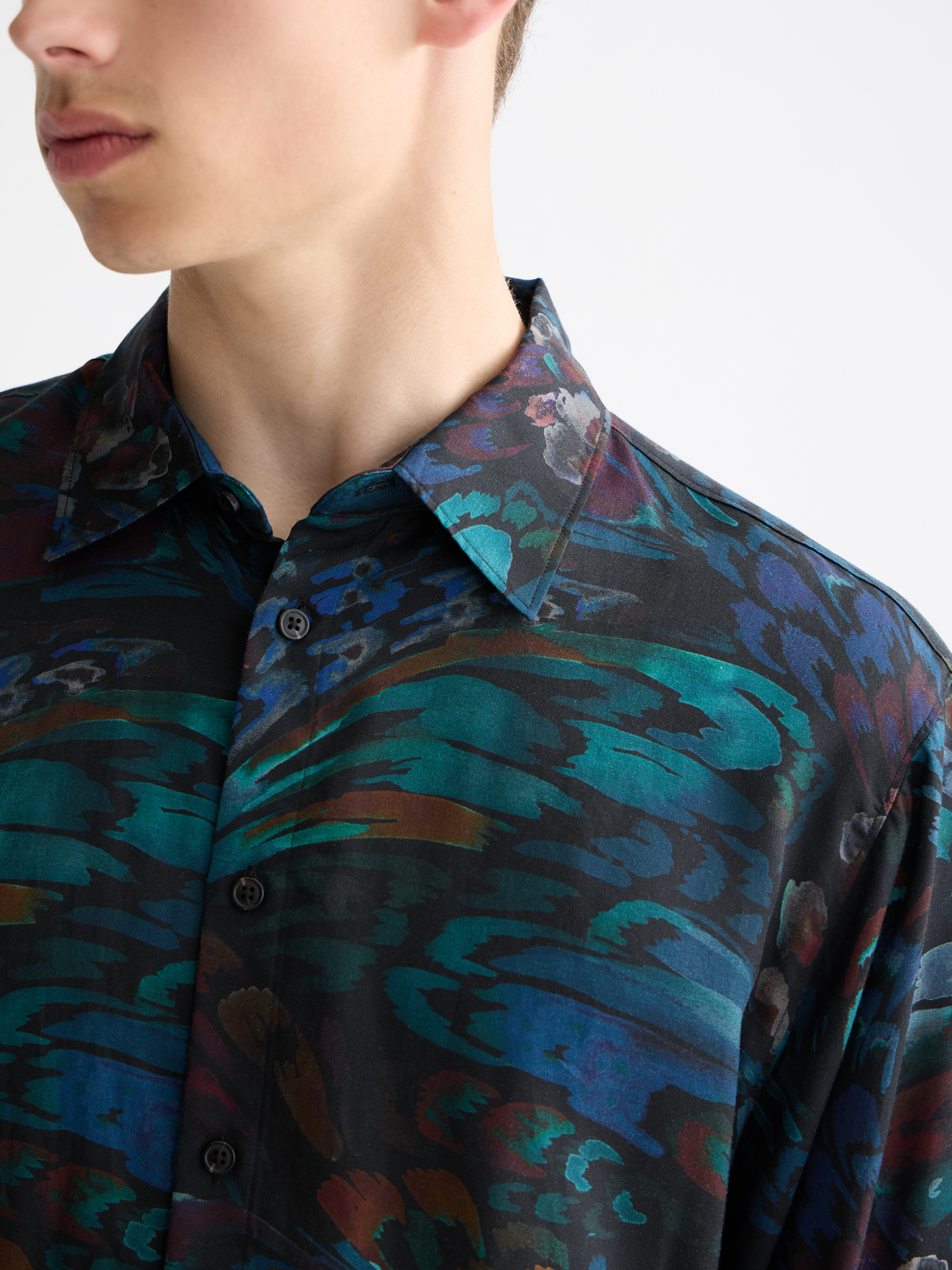 Long-sleeve printed shirt by Scotch & Soda, featuring vibrant pattern and casual fit, displayed on a plain background.