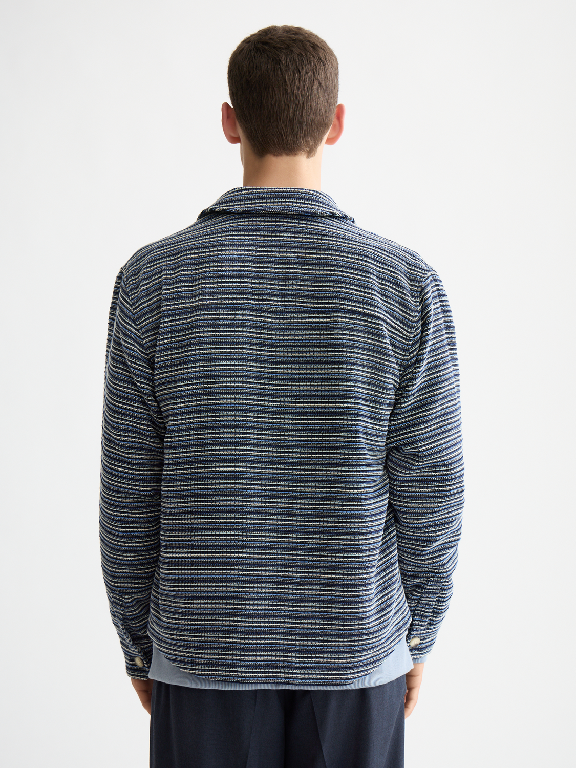 Structured striped overshirt jacket from Scotch & Soda with a classic fit and bold stripe pattern, displayed on a model.