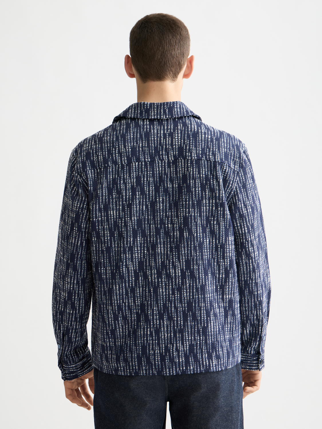 SCOTCH & SODA jacquard overshirt in dark plaid, featuring a button-up front and classic fit, shown in close-up view.