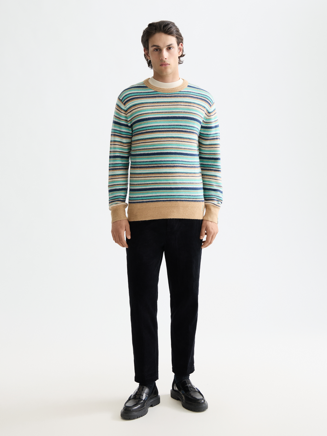 Striped SCOTCH & SODA knitwear pullover with long sleeves and crew neckline, featuring bold horizontal stripes in various colors.