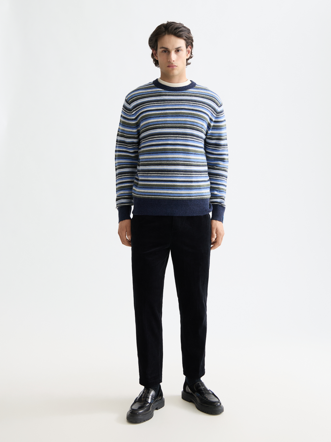 Striped Scotch & Soda knitwear pullover with a cozy, casual design featuring multicolored stripes and a round neckline.