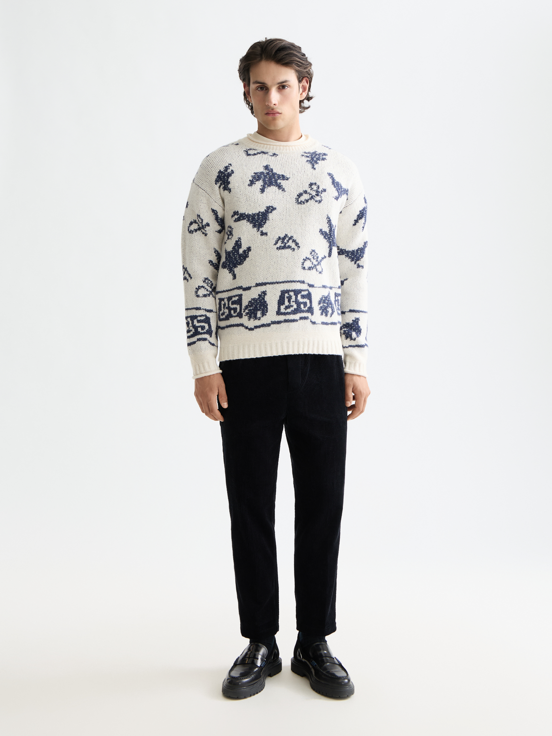 Scotch & Soda jacquard knit pullover in a stylish pattern, close-up of the textured knitwear fabric.