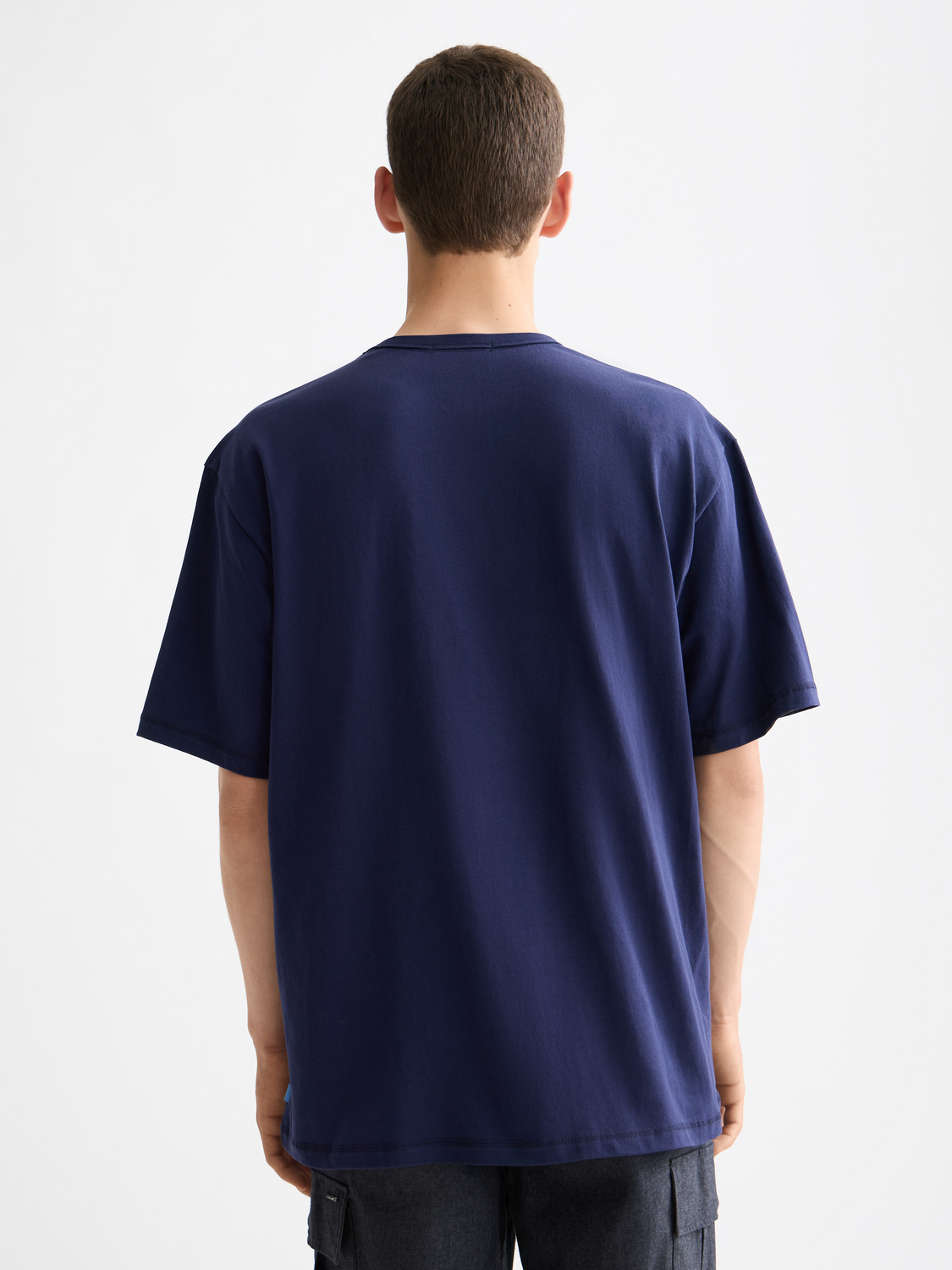 Short-sleeve embroidered T-shirt by Scotch & Soda with colorful floral embroidery on front and back.