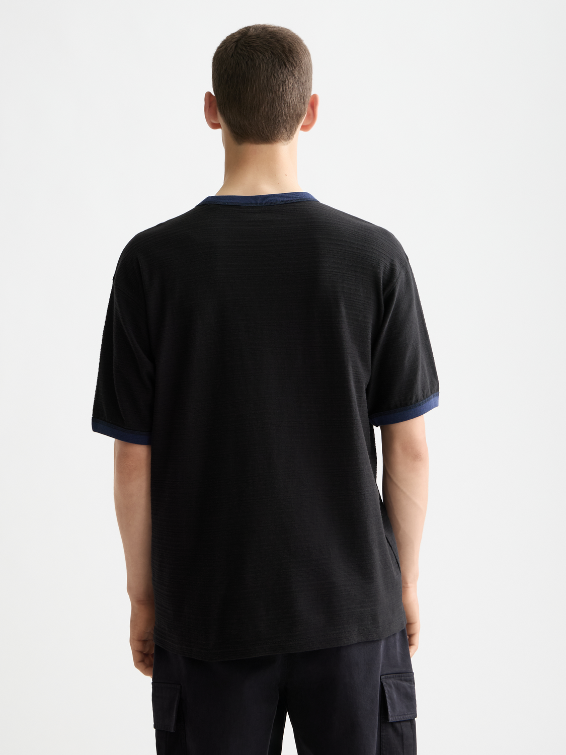 Scotch & Soda short sleeve t-shirt with bound neckline in black, casual style, displayed on a plain background.