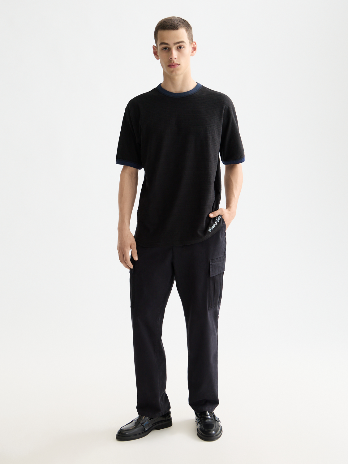 SCOTCH & SODA bound neckline short sleeve t-shirt with a sleek, minimalist design and comfortable fit.