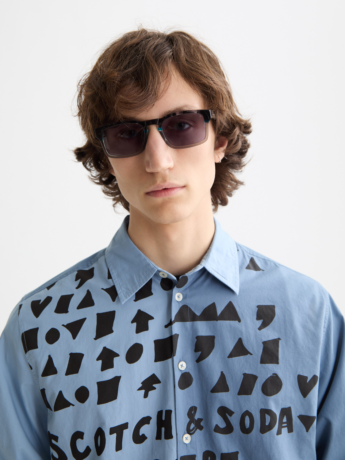 Long-sleeve Scotch & Soda poplin shirt in a classic design, shown on a model with a collar and button-front detail.