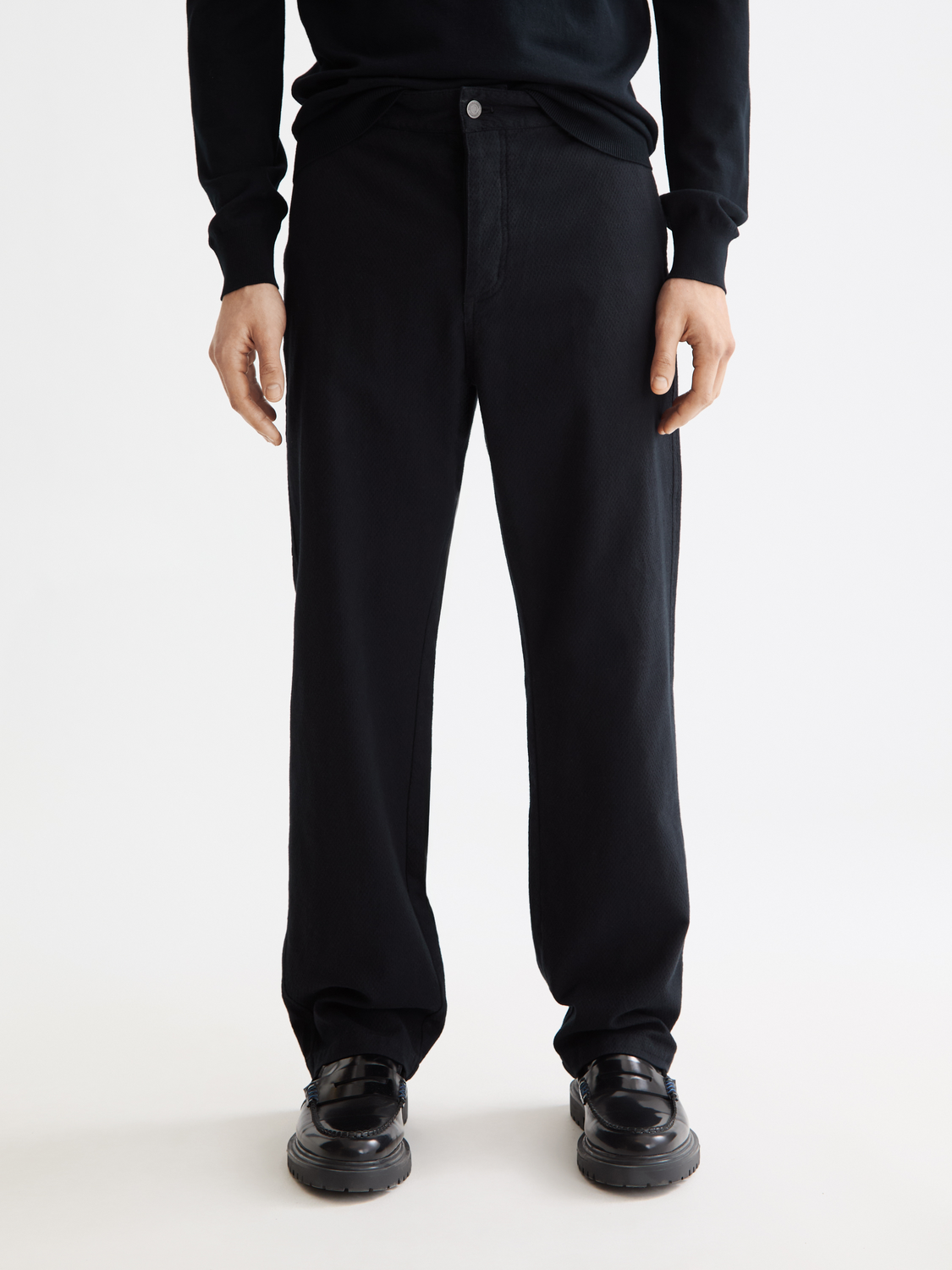 Scotch & Soda Verve straight-fit pants in dark fabric, showing front view with waistband and pockets.