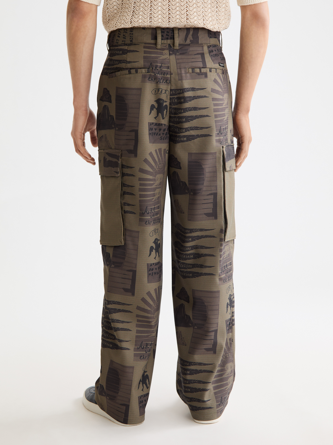 Printed cargo pants by Scotch & Soda with multiple pockets, relaxed fit, and stylish design, shown from the back.