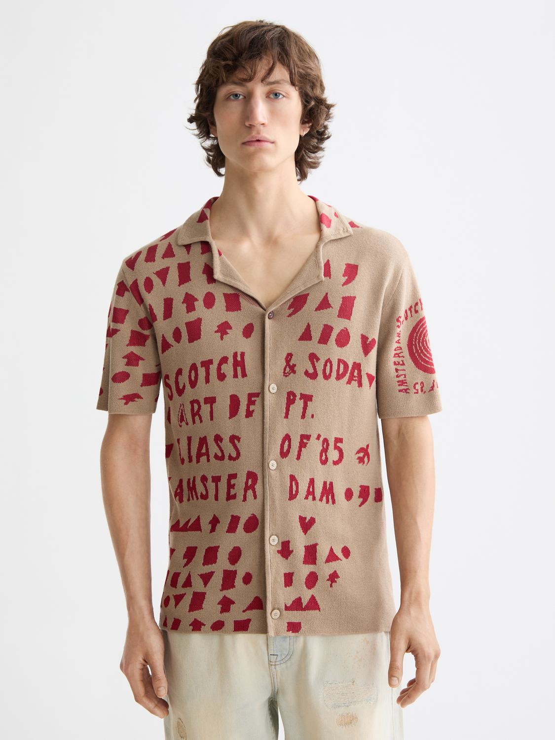 Jacquard knitted shirt by Scotch & Soda featuring intricate knit pattern and classic crew neckline.