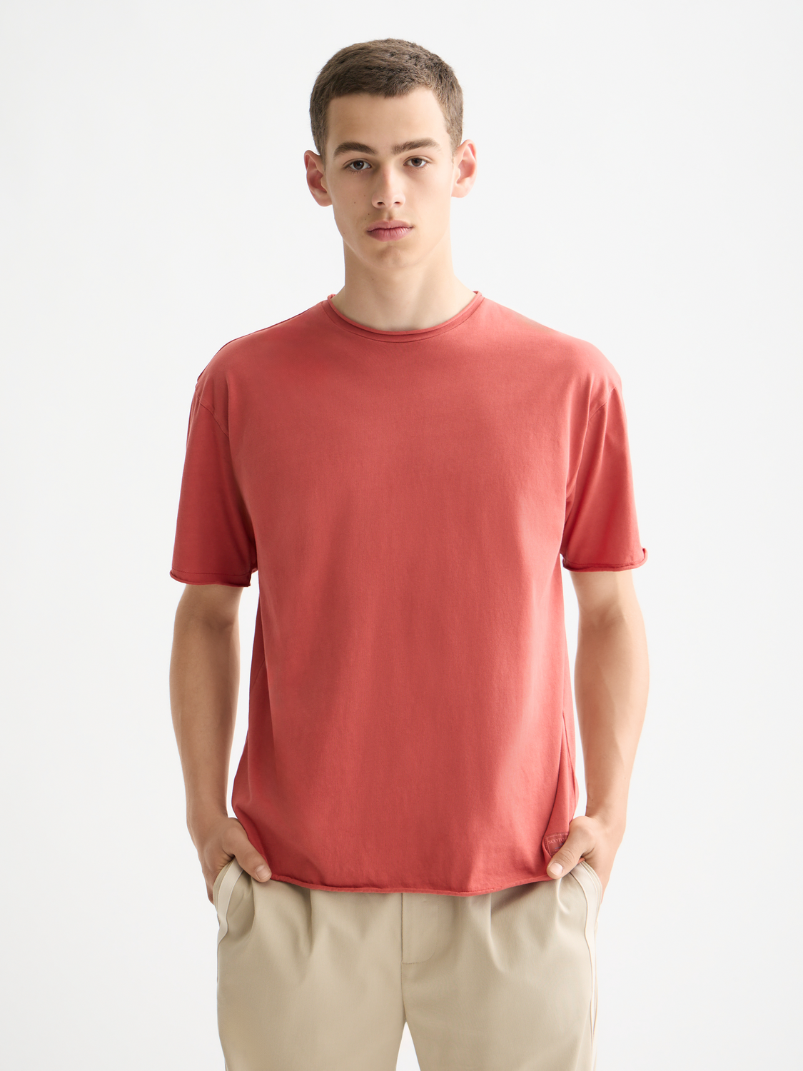 Scotch & Soda raw edge short sleeve t-shirt with distressed hem and casual fit, displayed on a neutral background