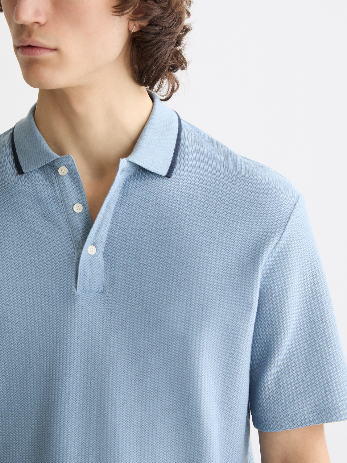 Structured Scotch & Soda polo shirt with a classic collar and short sleeves, displayed on a neutral background.